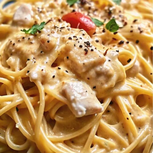 Chicken and spaghetti in a creamy sauce.