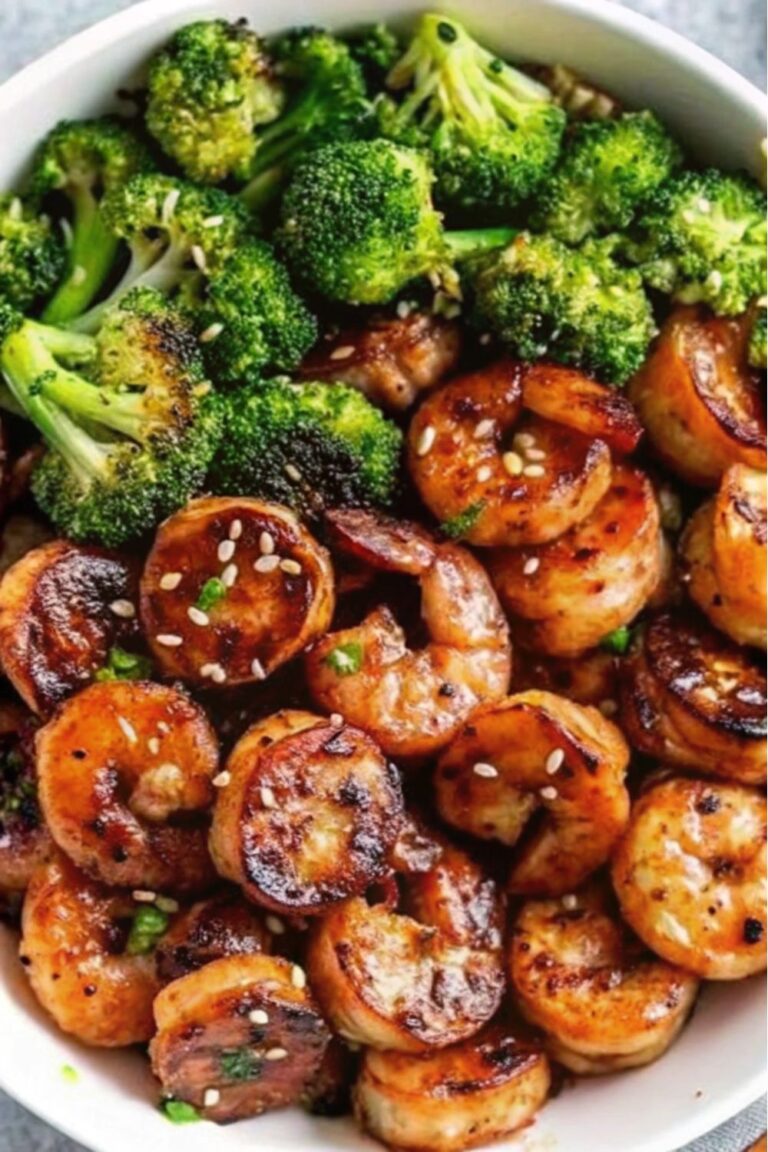 Cooked sausage with shrimp and broccoli.